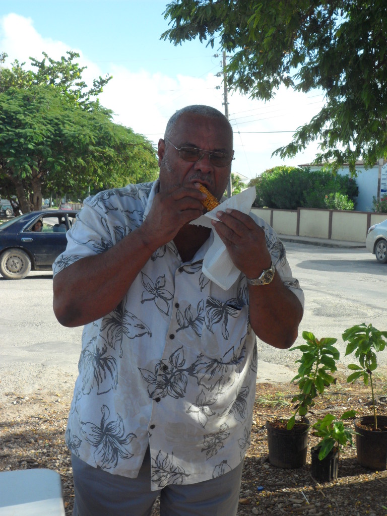 mitch eating roast corn in Anguilla