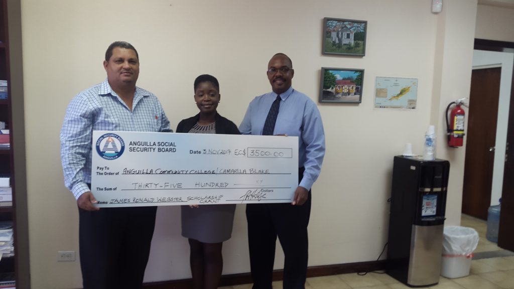 Winner Ms. Camarlla Blake with Director of Social Security, Mr. Timothy Hodge and President of Anguilla Community College, Dr. Karl Dawson